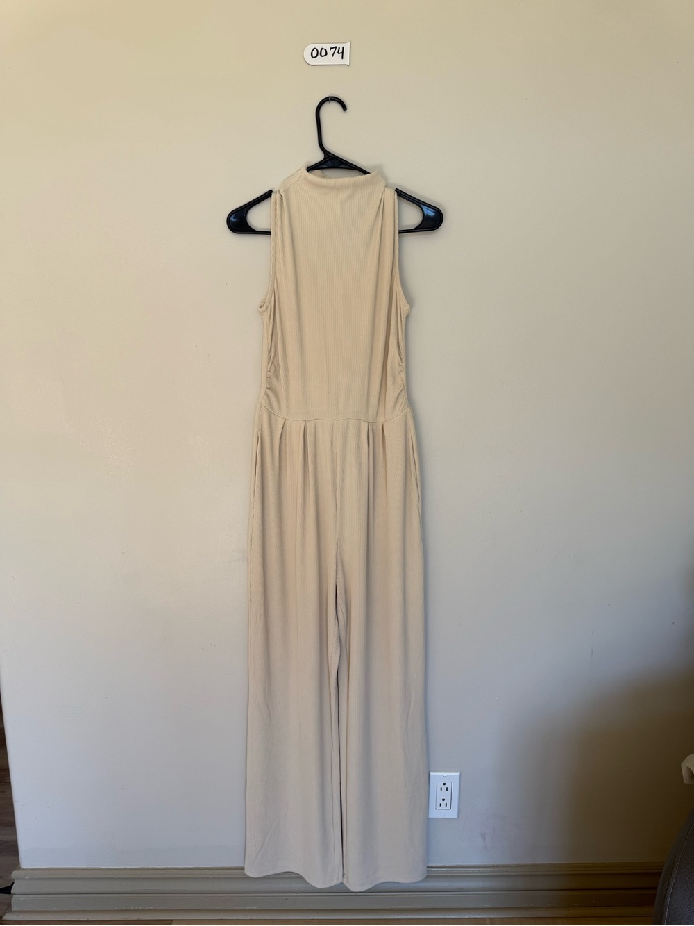 Sleeveless Cream High-Neck Wide-Leg Jumpsuit